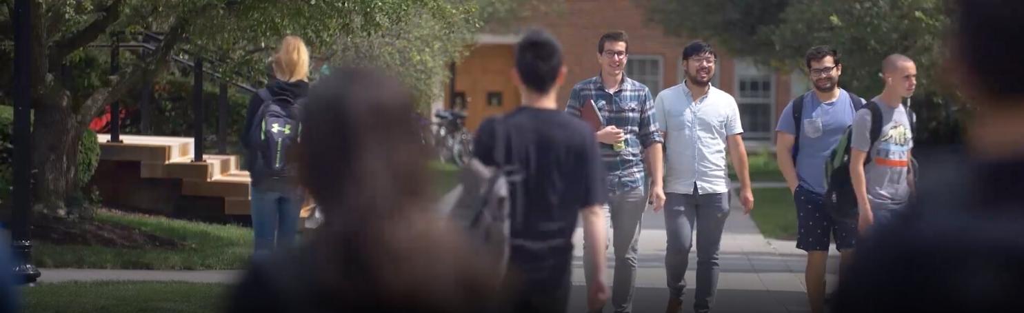 students walking across campus