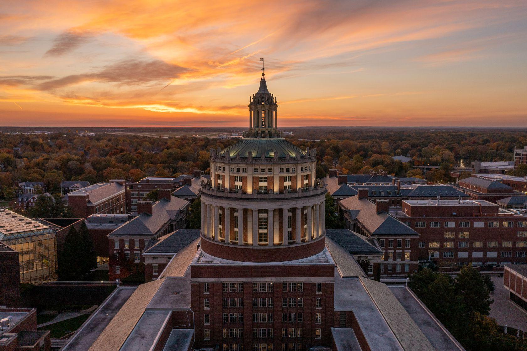 Aerial drone photo of Rush Rhees Library Tower, as seen during sunset October 24, 2023 // photo by AJ Pow / University of Rochester